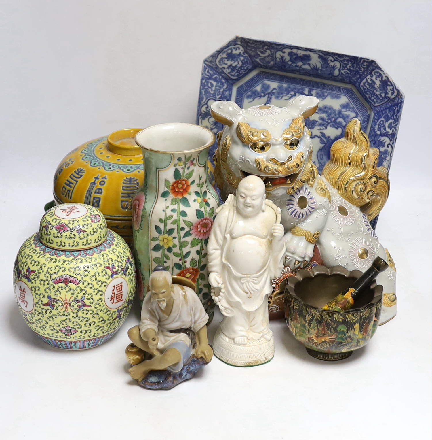 A collection of mostly Chinese ceramics, to include a vase, a lion dog, etc. blue and white dish 26cm square